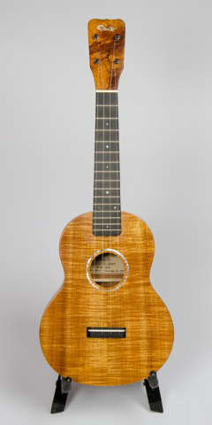 David Dart Koa Concert Ukulele, Style 1 (2016): curly koa top; one-piece koa back; koa neck; ebony fingerboard & bridge; abalone Dart logo (hand-cut), soundhole inlay (hand-cut), & fingerboard dots