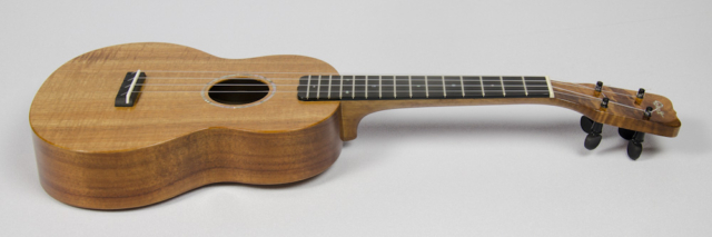 David Dart Koa Concert Ukulele, Style 1 (2016): curly koa top; one-piece koa back; koa neck; ebony fingerboard & bridge; abalone Dart logo (hand-cut), soundhole inlay (hand-cut), & fingerboard dots